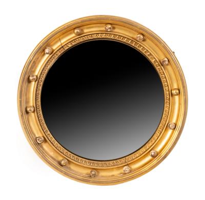 A gilt framed convex mirror, in