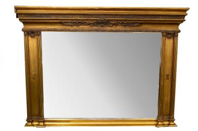 A gilt framed overmantel mirror,