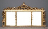 A gilt framed rectangular over