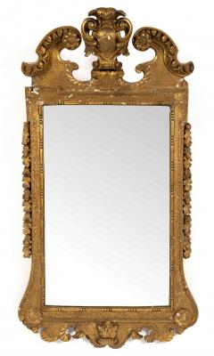 A gilt gesso framed mirror of