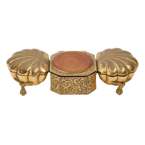 A gilt lacquered and engraved brass