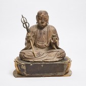 A Gilt Lacquered Wood Figure o