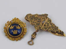 A gilt metal and blue enamel