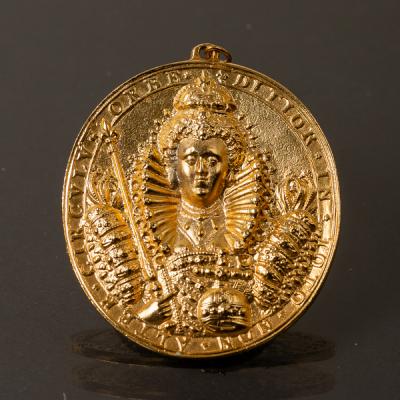 A gilt metal cast copy of the
