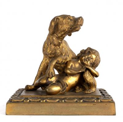 A gilt metal figure of a dog