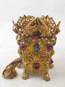 A gilt metal hanging lamp with