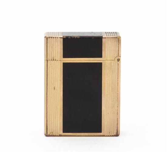A Gilt Metal Lighter S.T. Dupont.