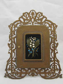 A gilt metal picture frame (with