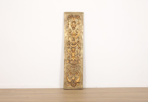 A GILT PLASTER RECTANGULAR PANEL OF