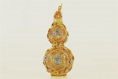 A GILT-SILVER DOUBLE-GOURD VAS