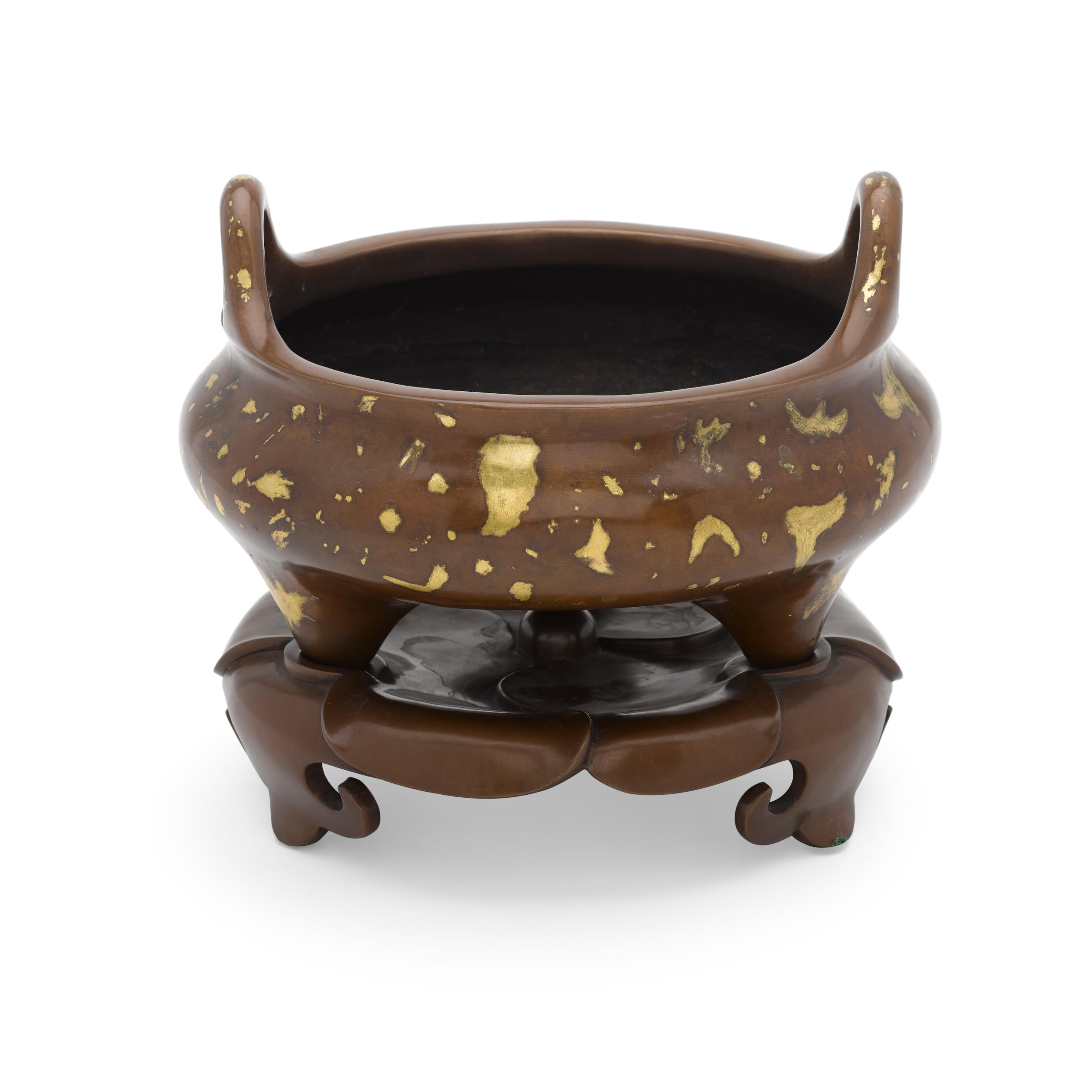 A GILT-SPLASHED BRONZE TRIPOD
