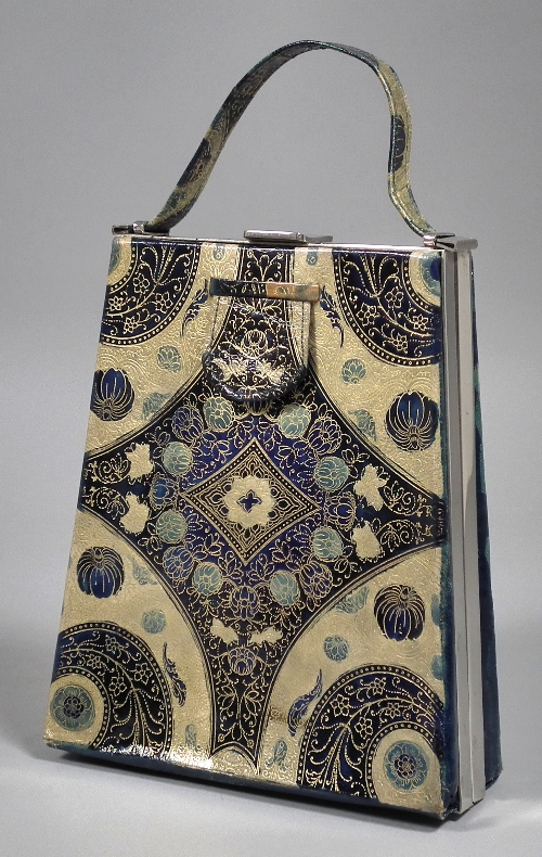 A gilt tooled blue leather