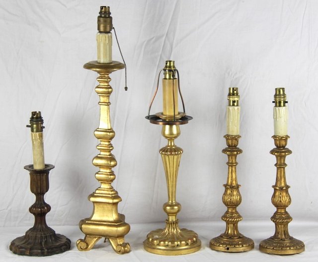 A gilt wood candlestick-type