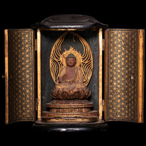 A Gilt Wood Figure of Buddha