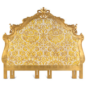 A Giltwood Headboard with Fortuny