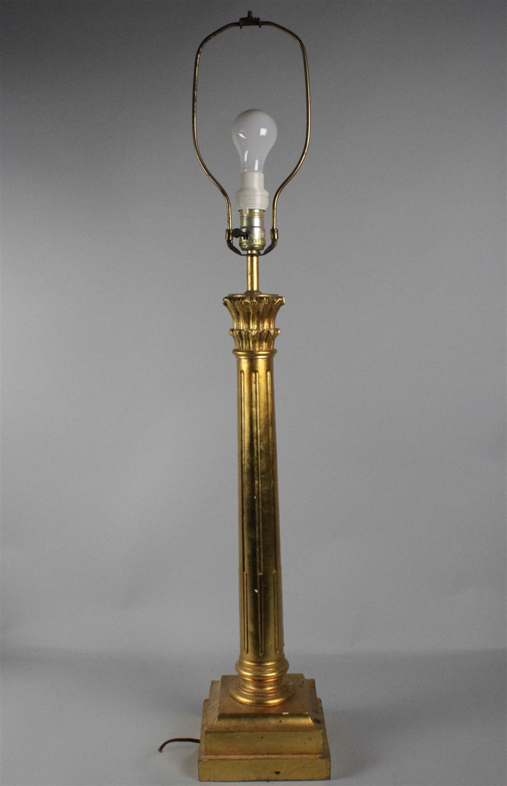 A GILTWOOD LAMP IN THE FORM OF A
