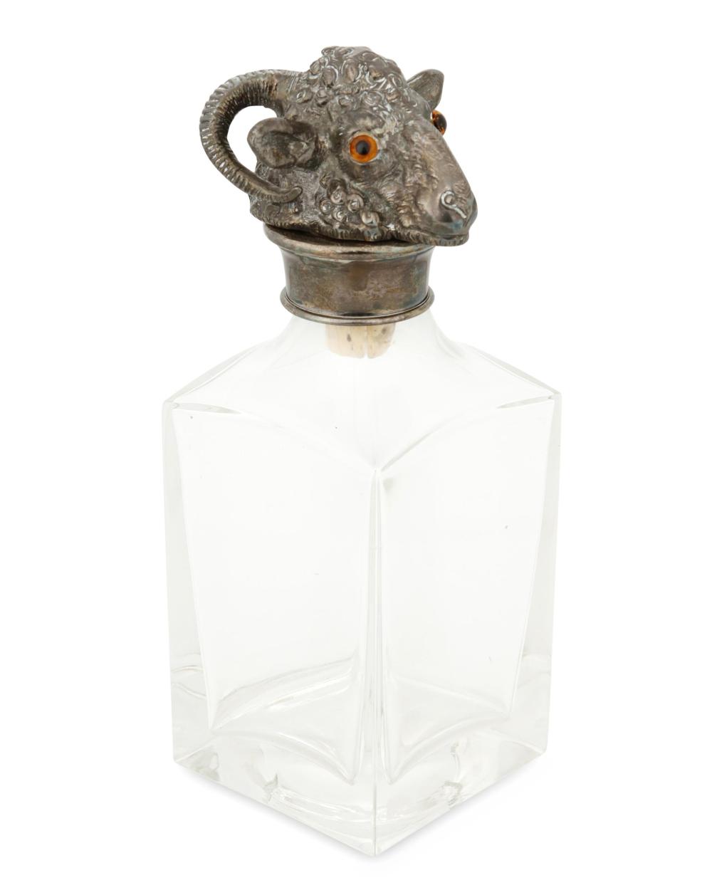 A GLASS AND SILVER-PLATE RAM'S HEAD