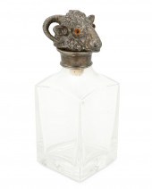 A GLASS AND SILVER-PLATE RAM'S