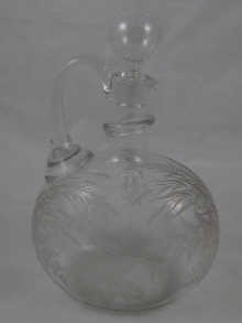 A glass claret jug finely