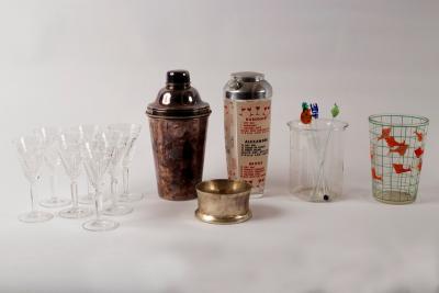 A glass cocktail shaker with
