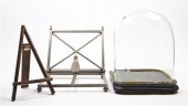 A Glass Dust Dome and Two Tabl