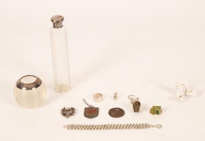 A glass jar with silver lid, a