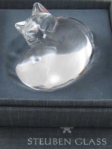 A glass paperweight designed as a