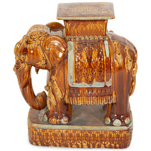 A Glazed Ceramic Elelphant Table