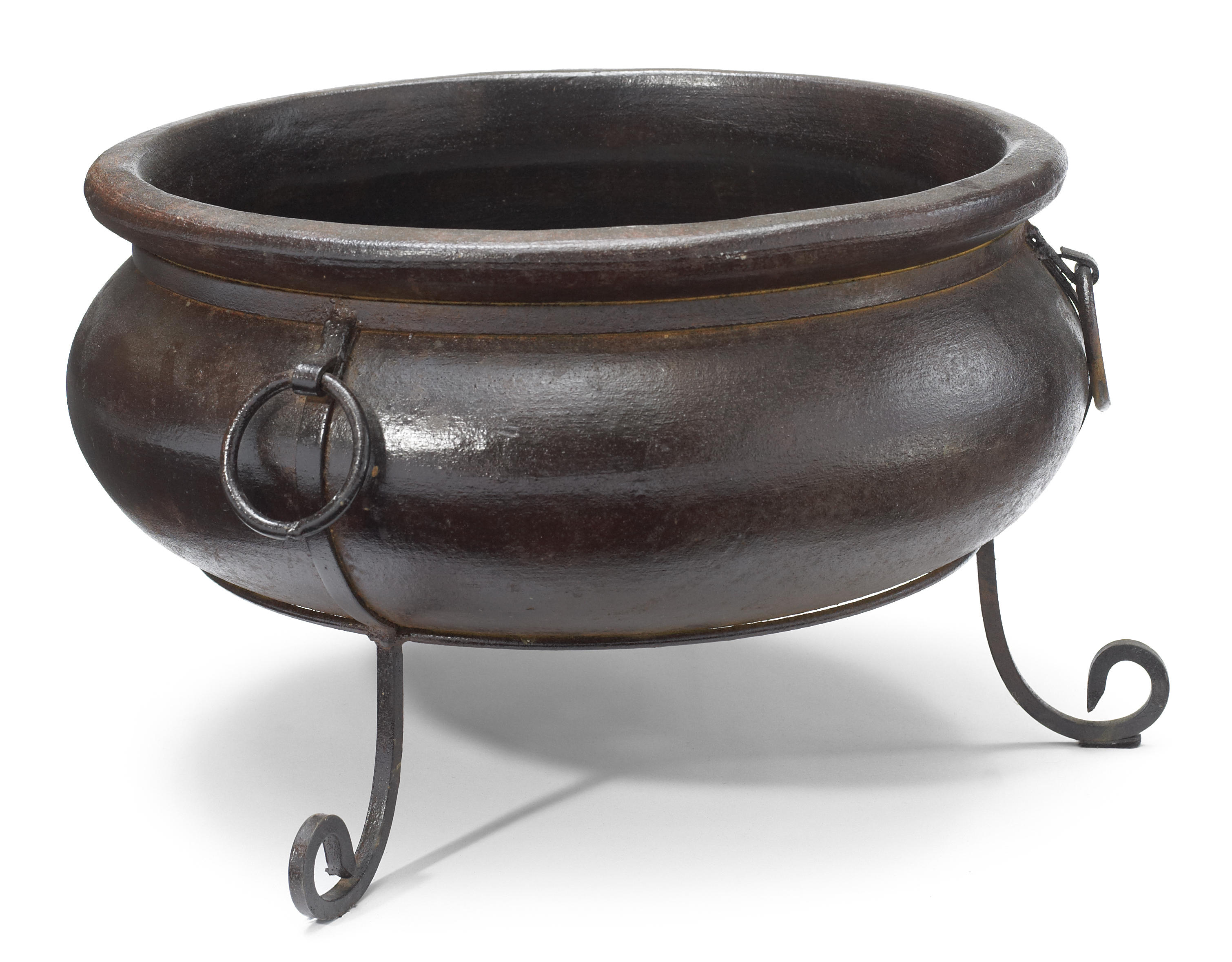 A glazed earthenware and wrought