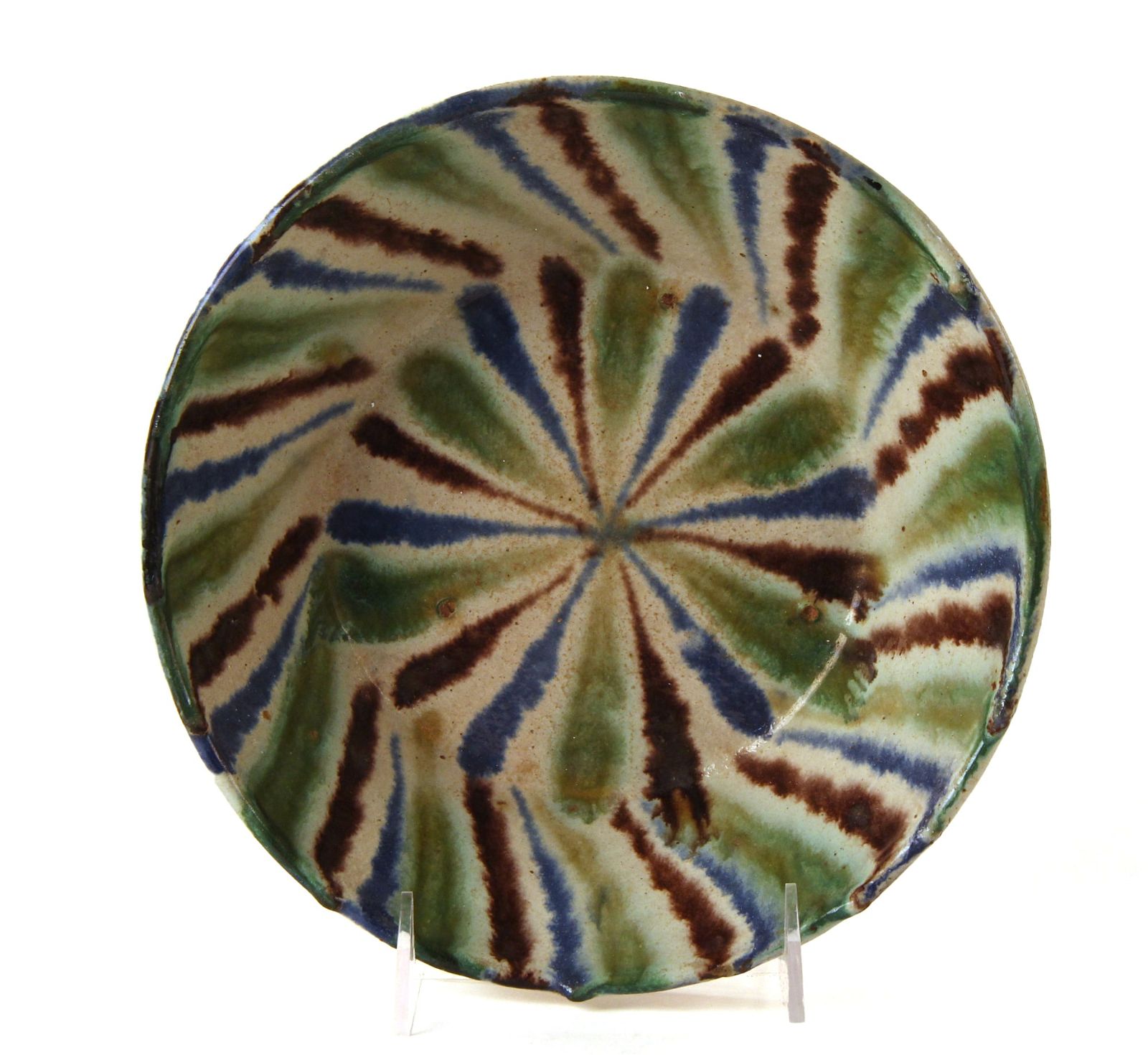 A GLAZED EARTHENWARE ISLAMIC