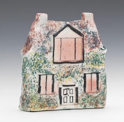 A Glazed Pottery Cottage Money