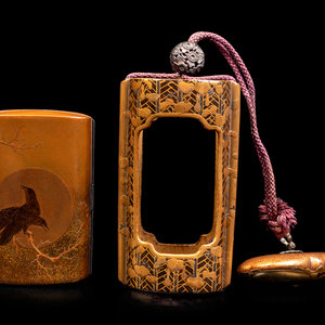 A Gold and Black Lacquer Inro