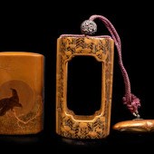 A Gold and Black Lacquer Inro