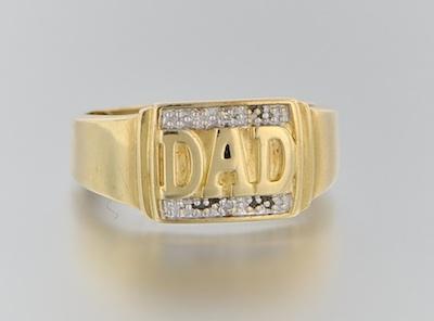 A Gold and Diamond "Dad" Ring 10k