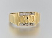 A Gold and Diamond "Dad" Ring