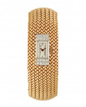 A GOLD AND DIAMOND WATCH BRACE
