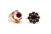 A GOLD AND GARNET NINE STONE C