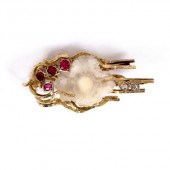 A gold and gem-set pendant, by
