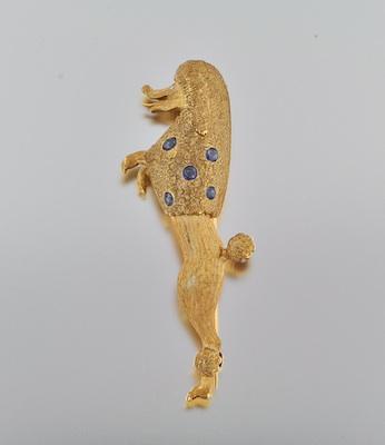 A Gold and Sapphire Poodle Brooch