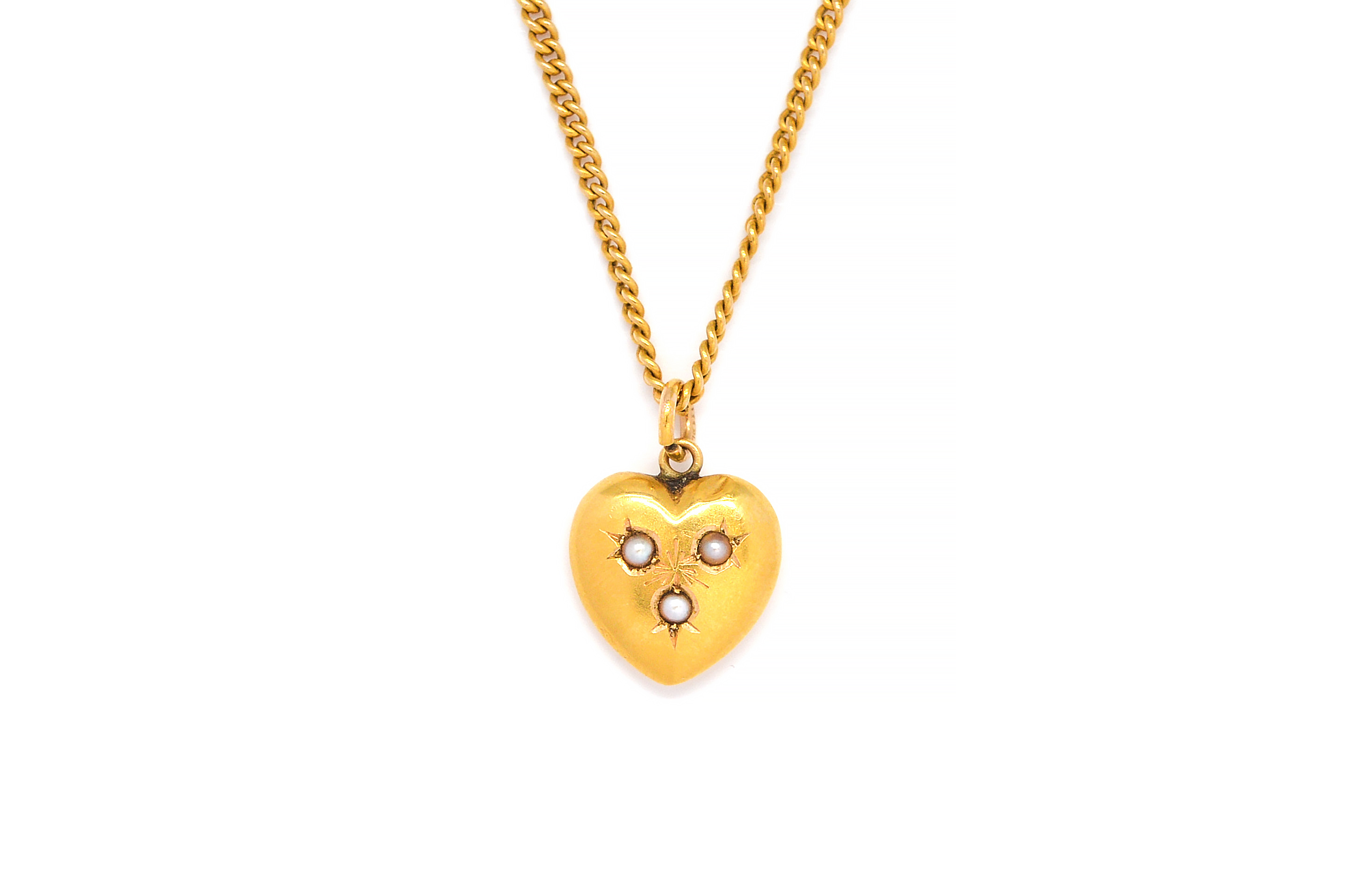 A GOLD AND SEED PEARL HEART