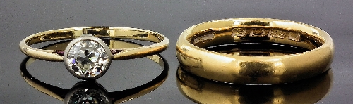 A gold coloured metal and a