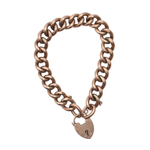 A gold curb bracelet and