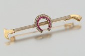A Gold Diamond and Ruby Riding