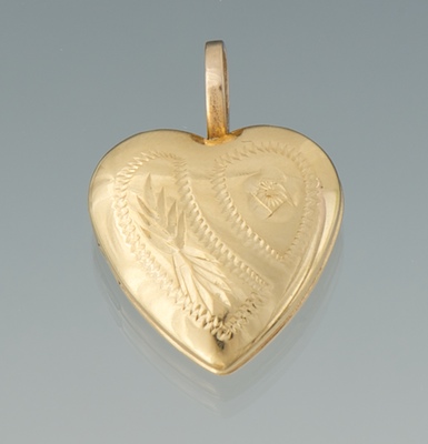 A Gold Heart Locket Pendant 14k