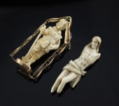 A gold mounted ivory brooch wi