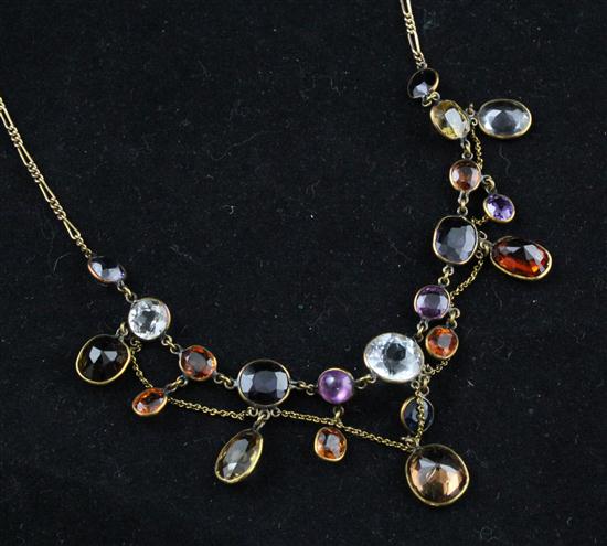 A gold mounted multi-gem set fringe