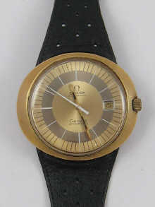 A gold plated and steel Omega