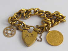 A gold plated bracelet with a
