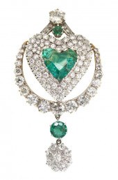 *A Gold Simulated Emerald and