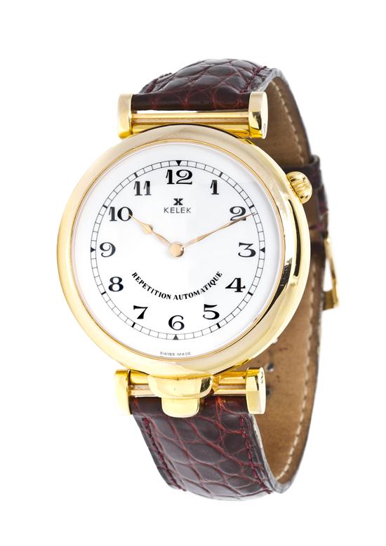 A Gold Tone Five Minute Repeater